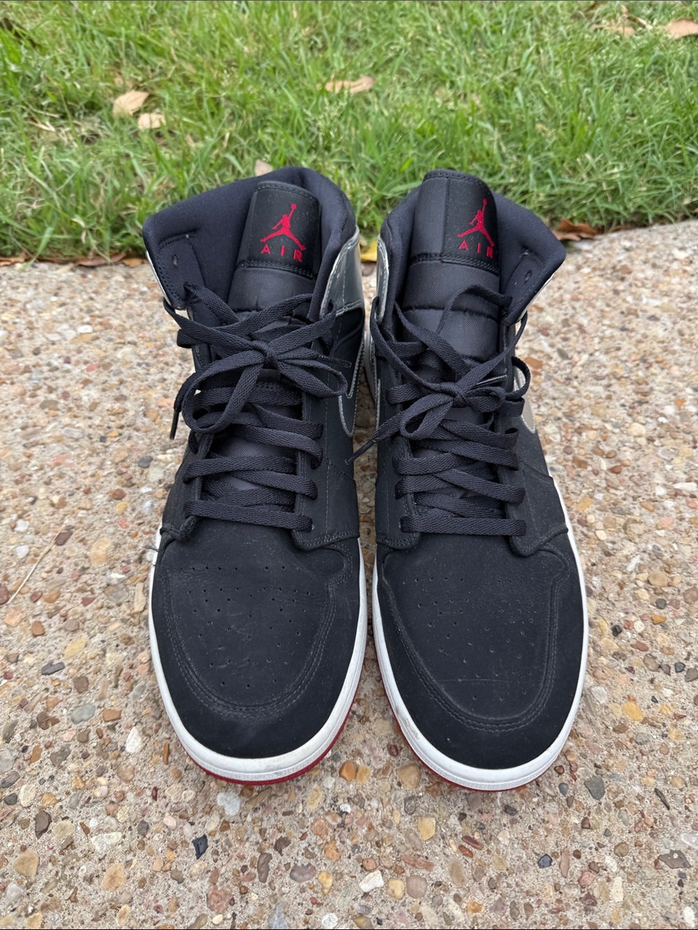 Jordan Black and Red Mid-Top Sneakers